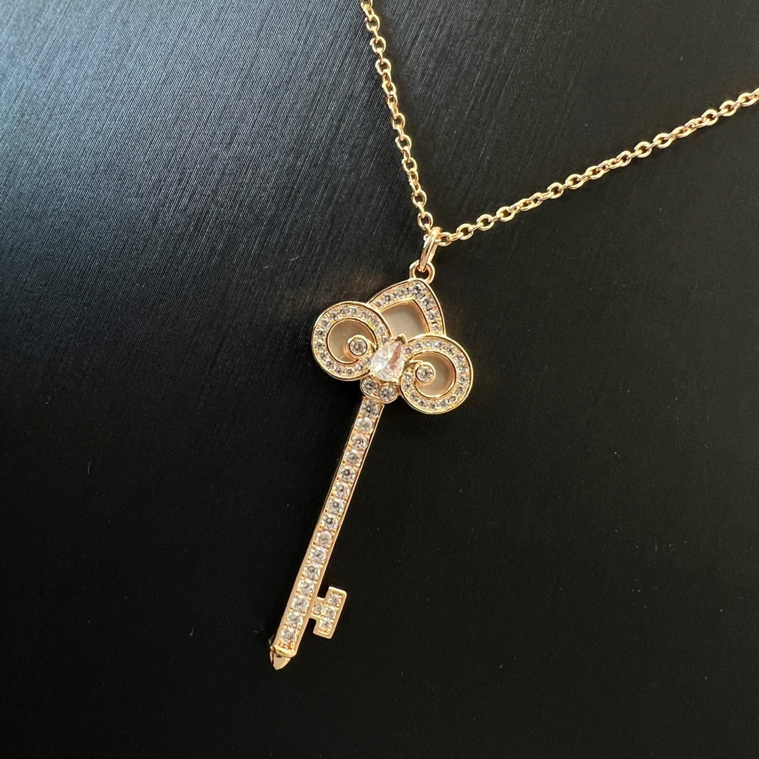 T key necklace