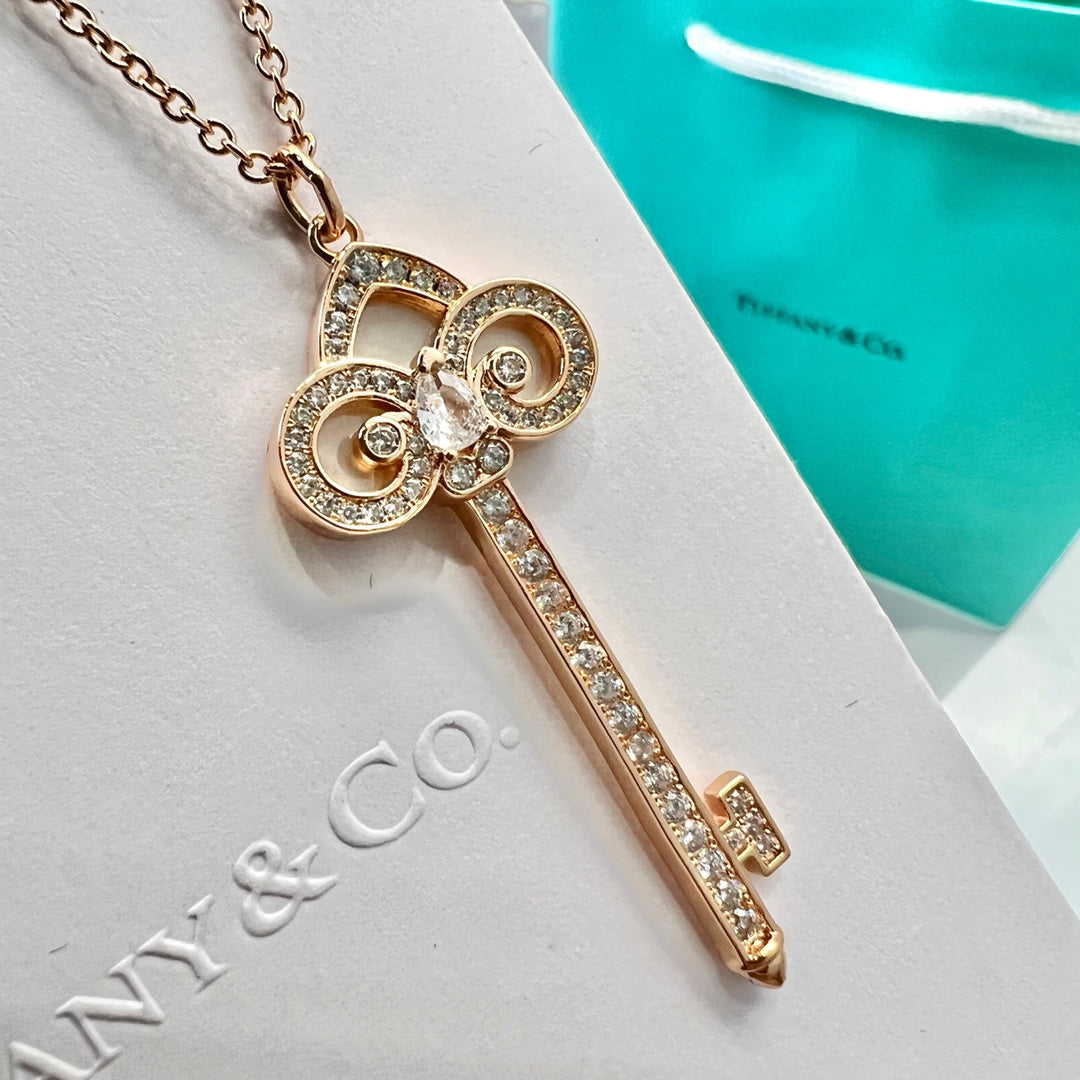T key necklace