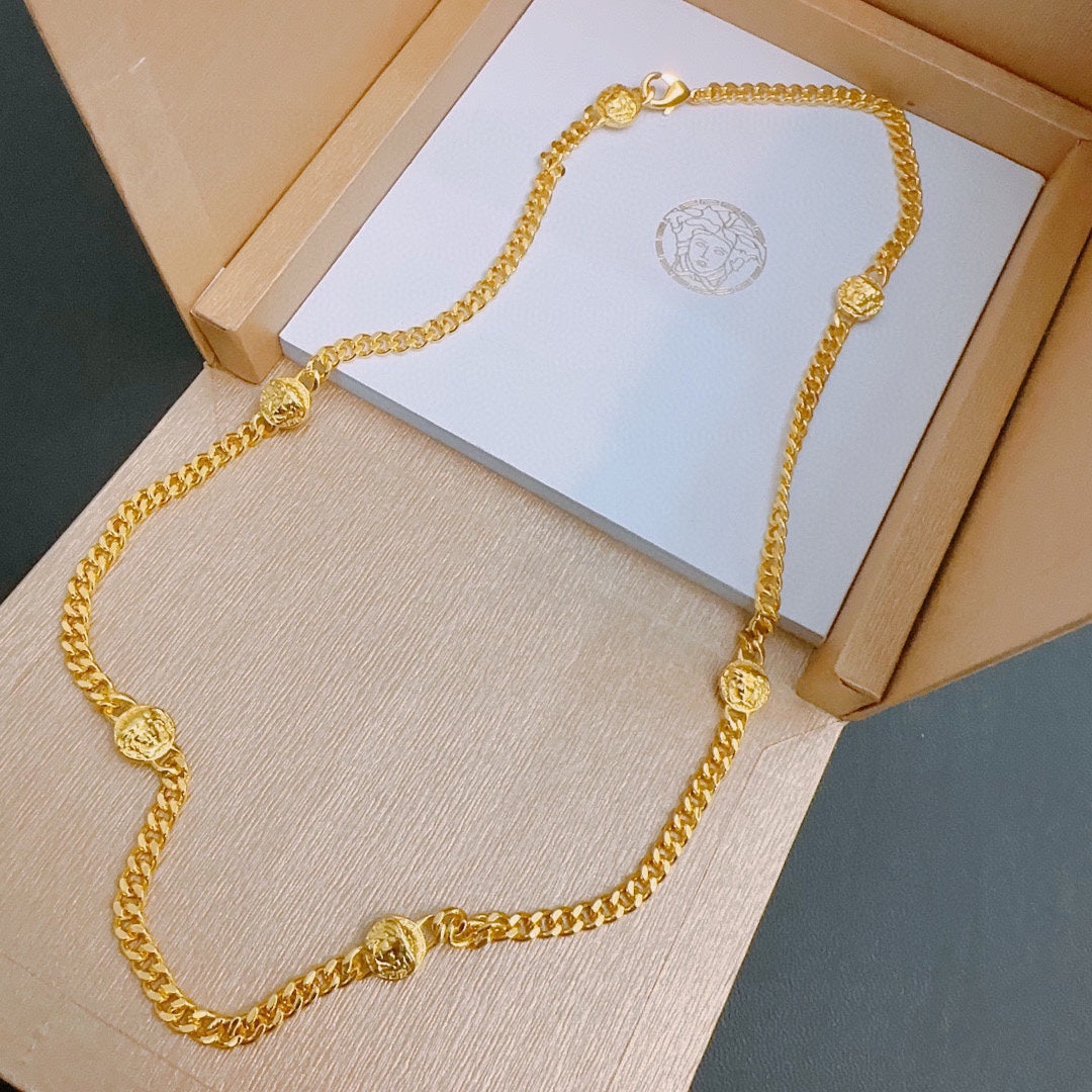 V gold necklace