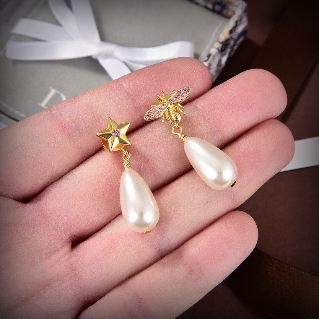 D long pearl earrings