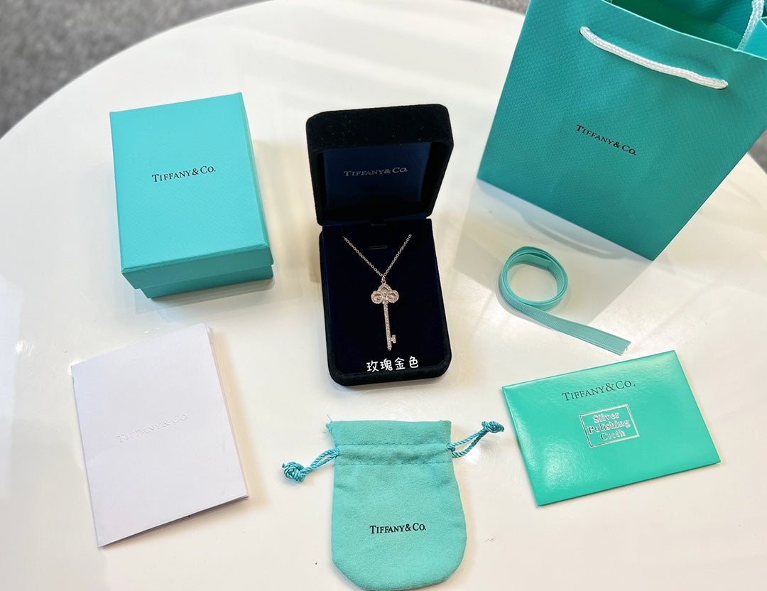 T key necklace