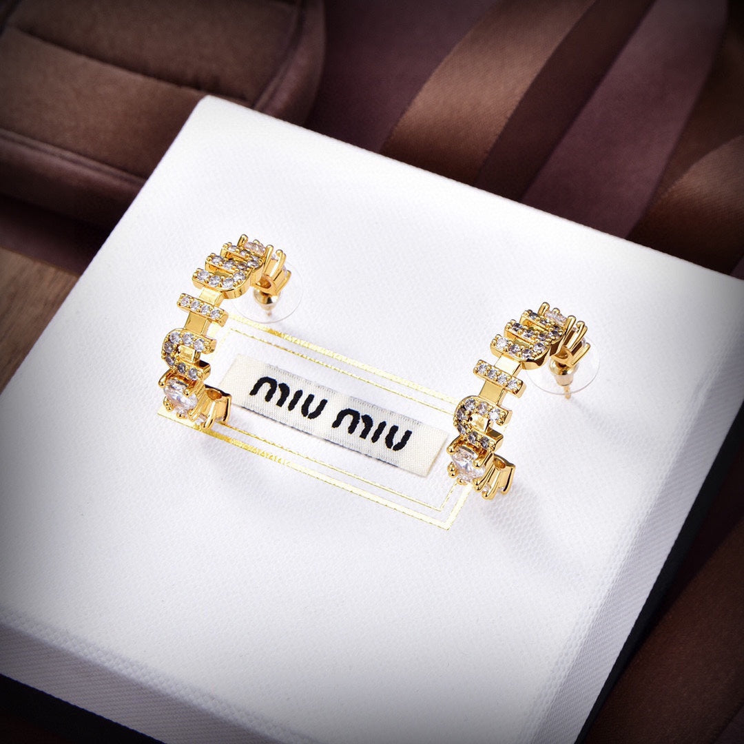 MM rounded logo earrings in gold