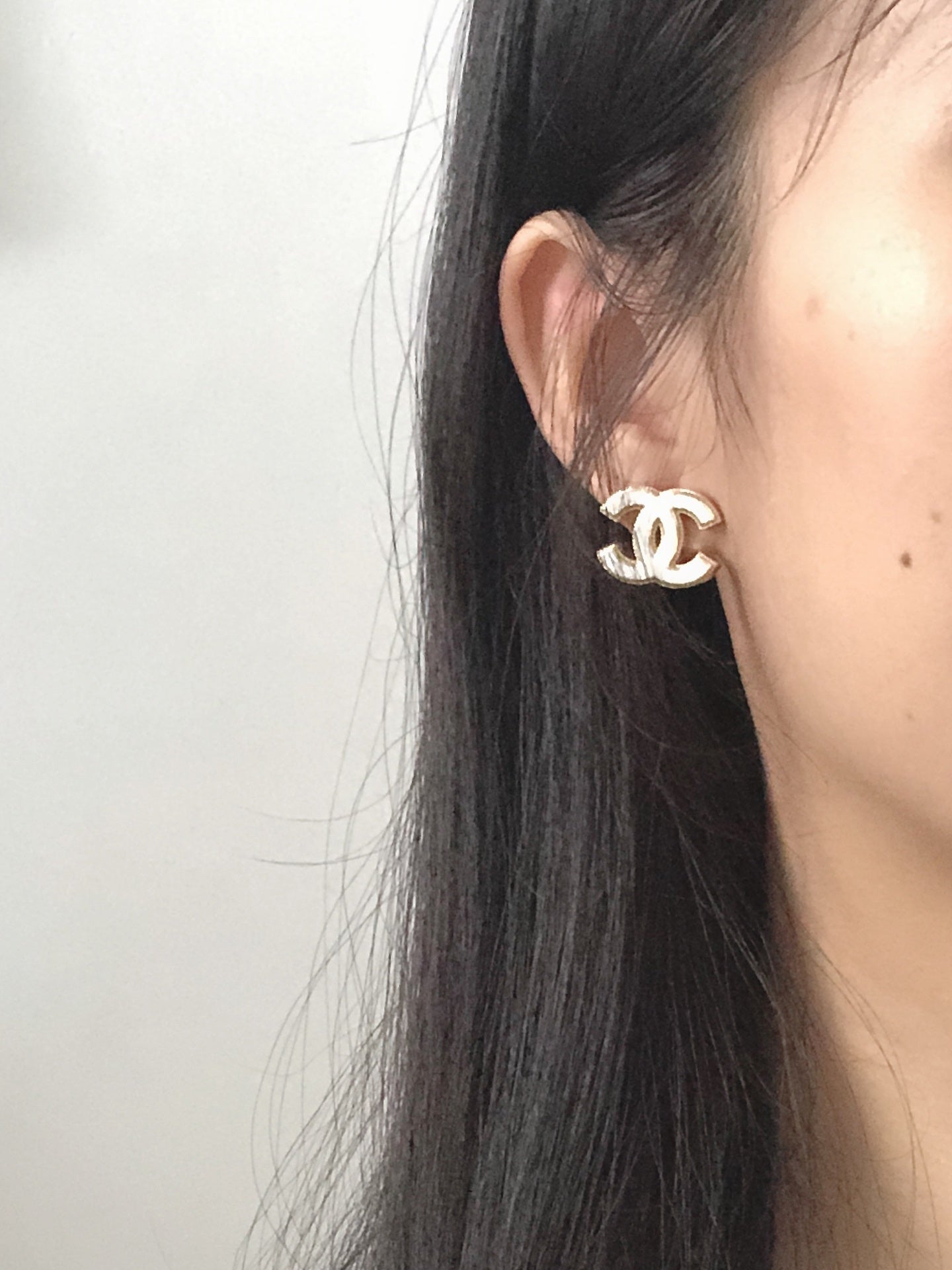 C white logo earrings