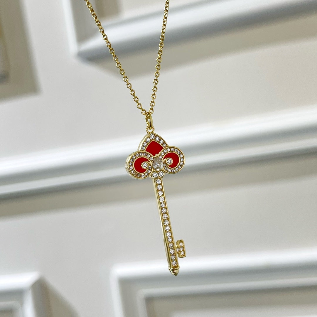 T key necklace