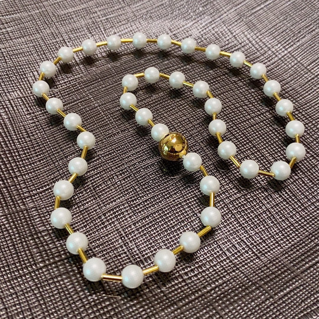 B pearl necklace