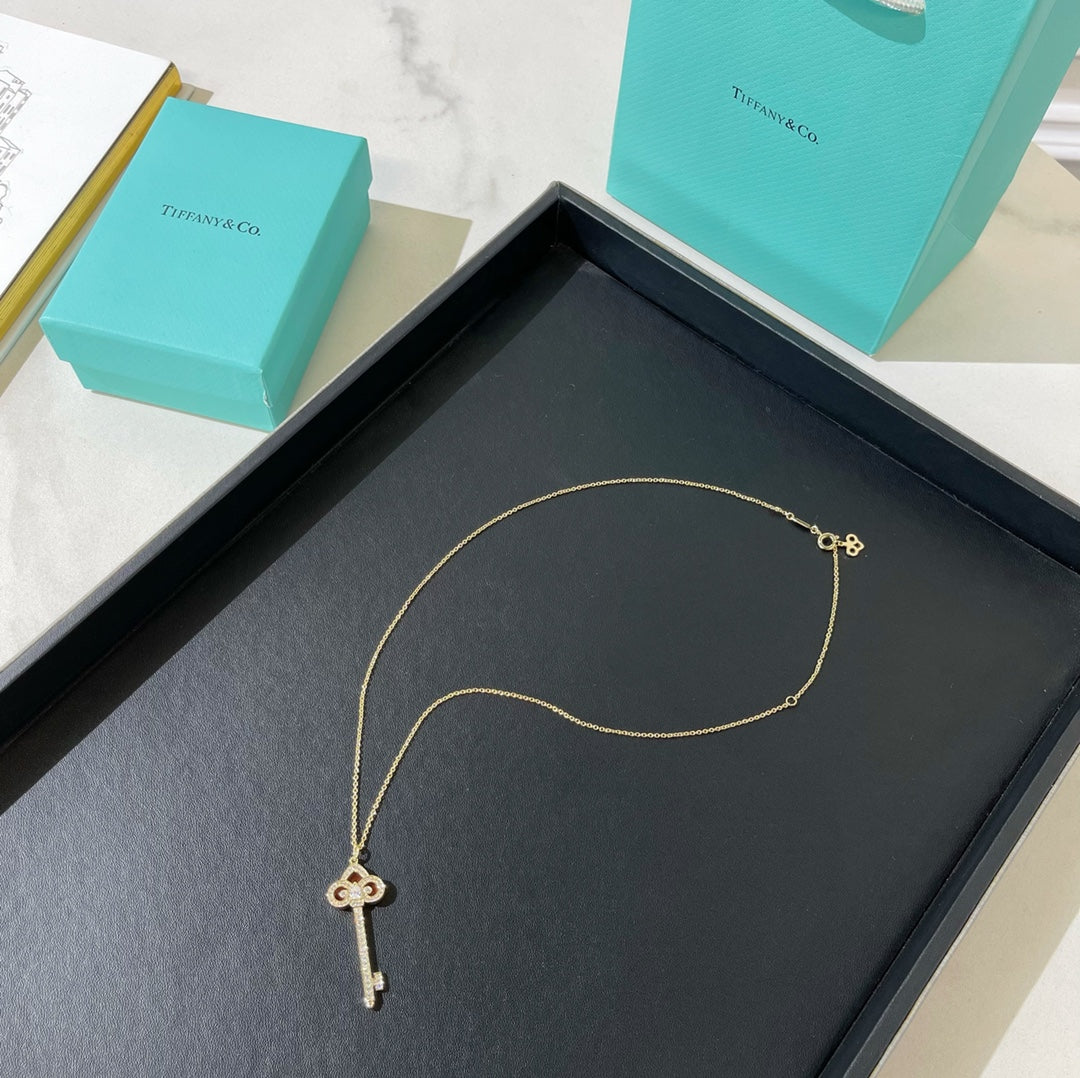 T key necklace
