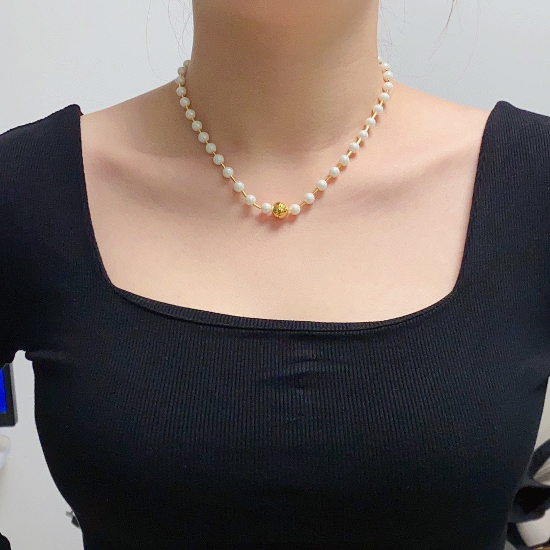 B pearl necklace