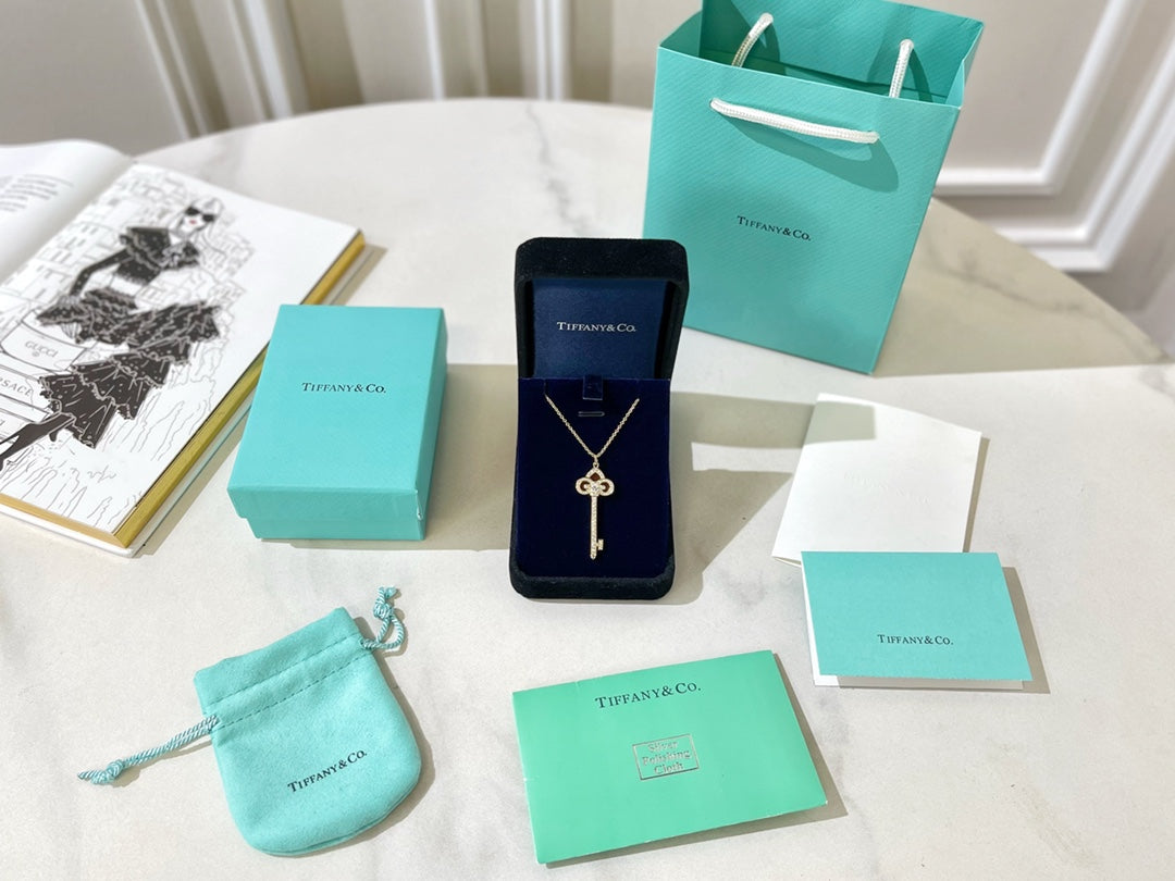 T key necklace