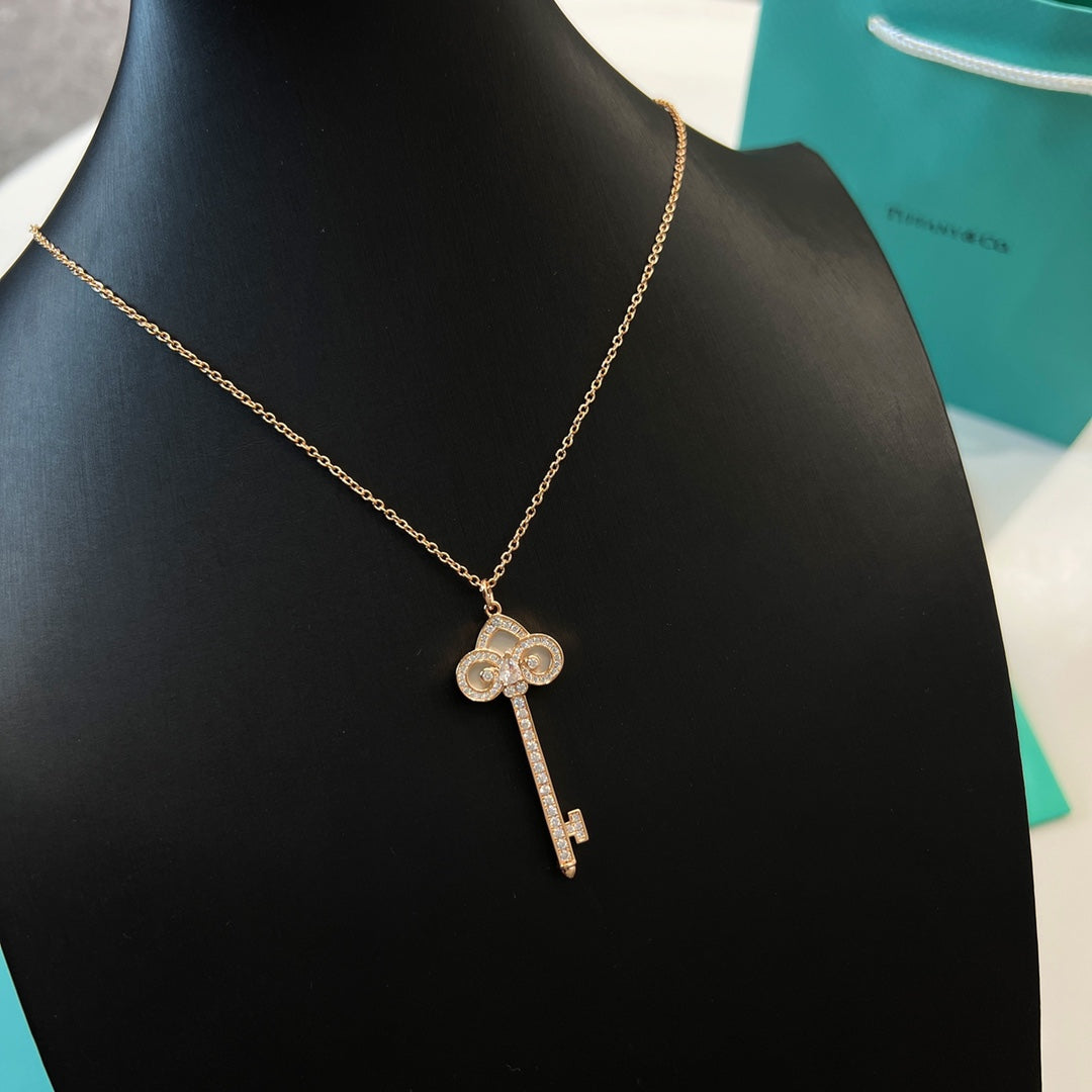 T key necklace