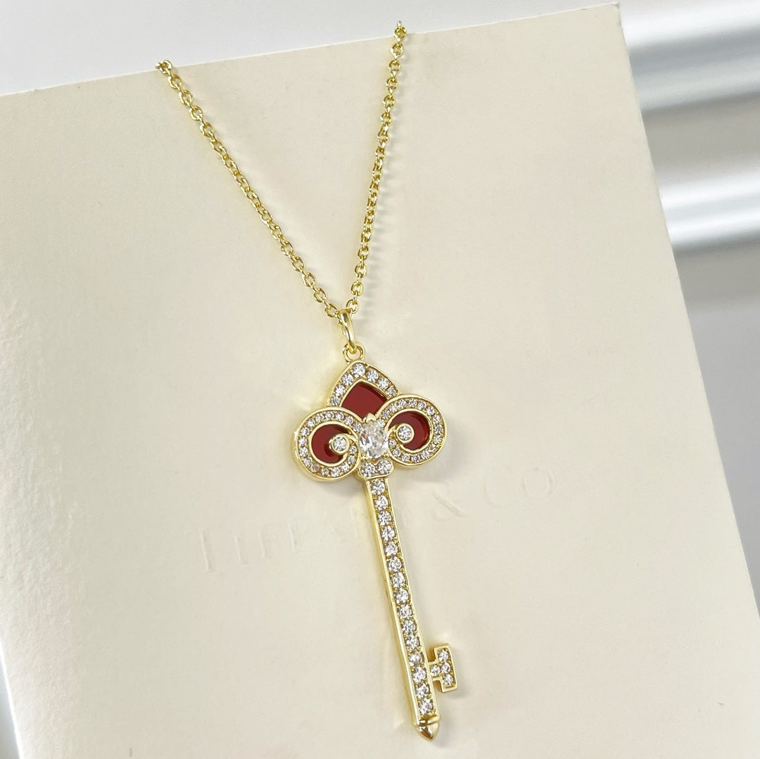 T key necklace