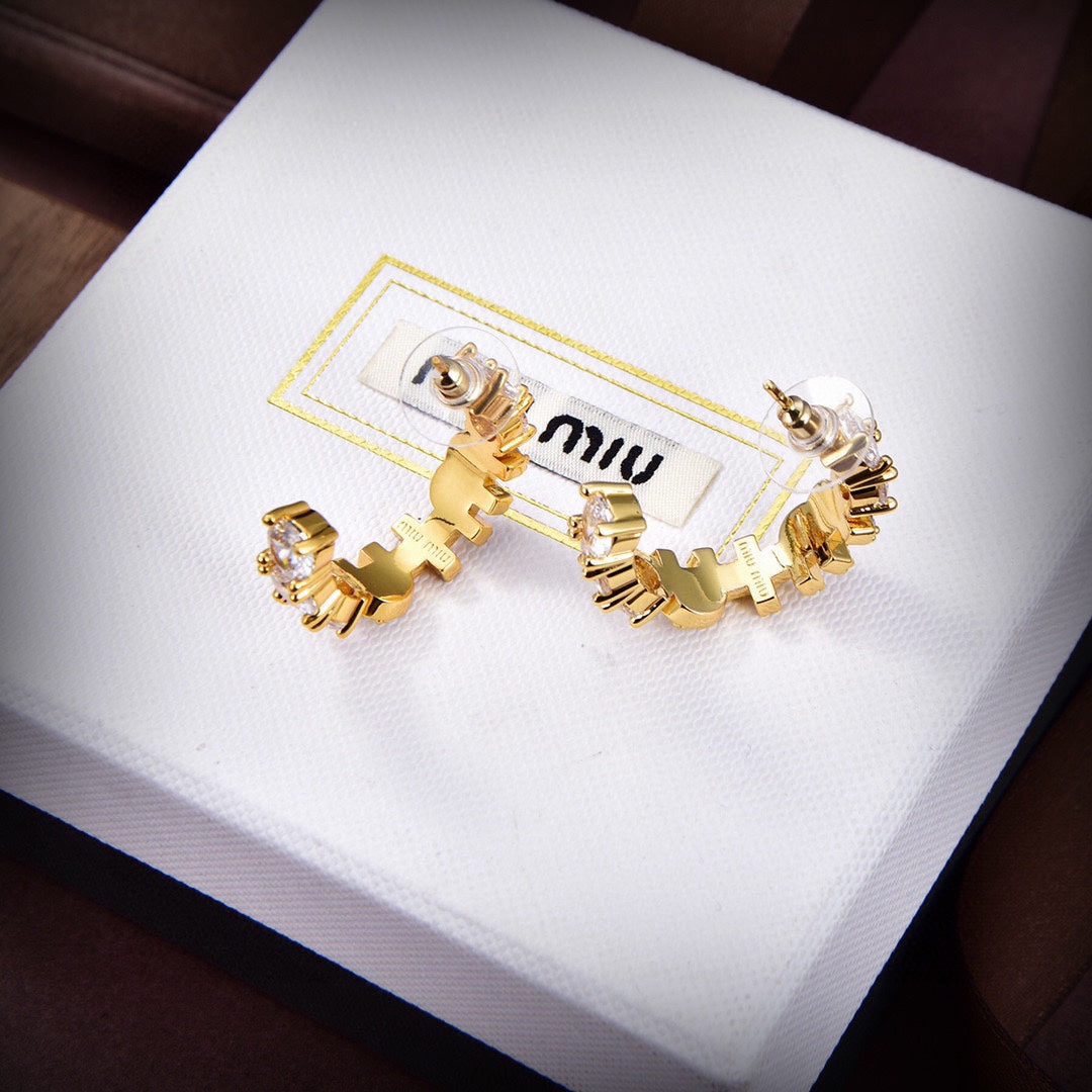 MM rounded logo earrings in gold