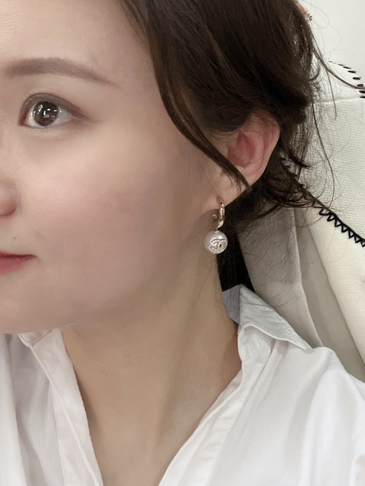 C pearl and gold earrings