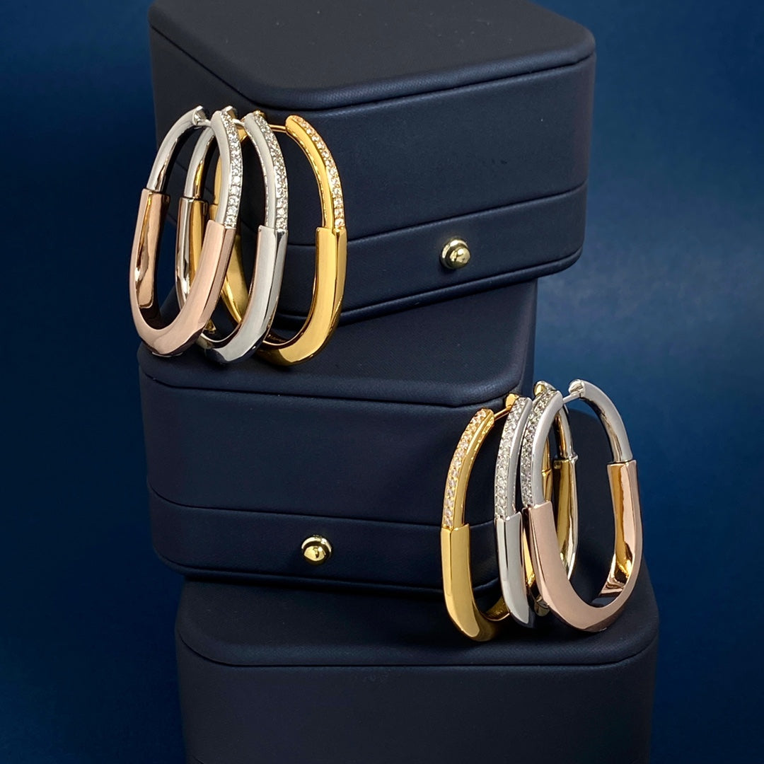 T bangle earrings with diamonds