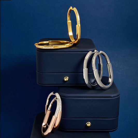 T bangle earrings with diamonds