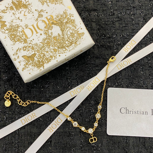 D logo - gold and diamonds bracelet