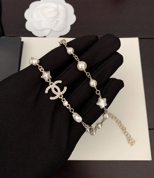 C star and logo necklace