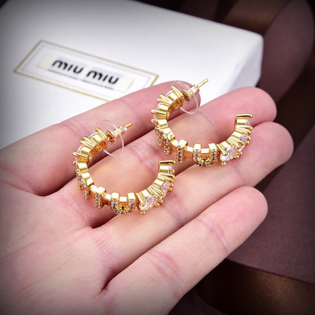 MM rounded logo earrings in gold