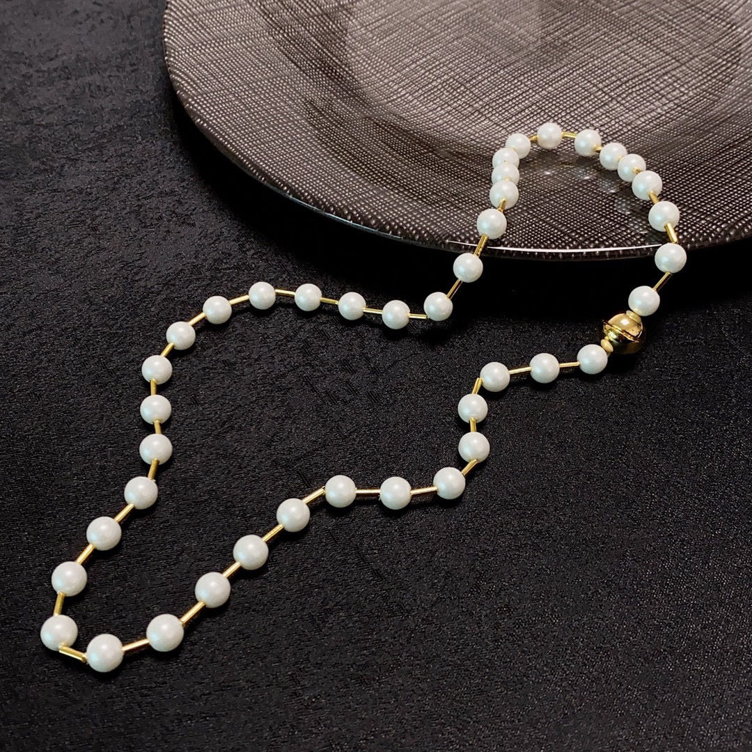 B pearl necklace