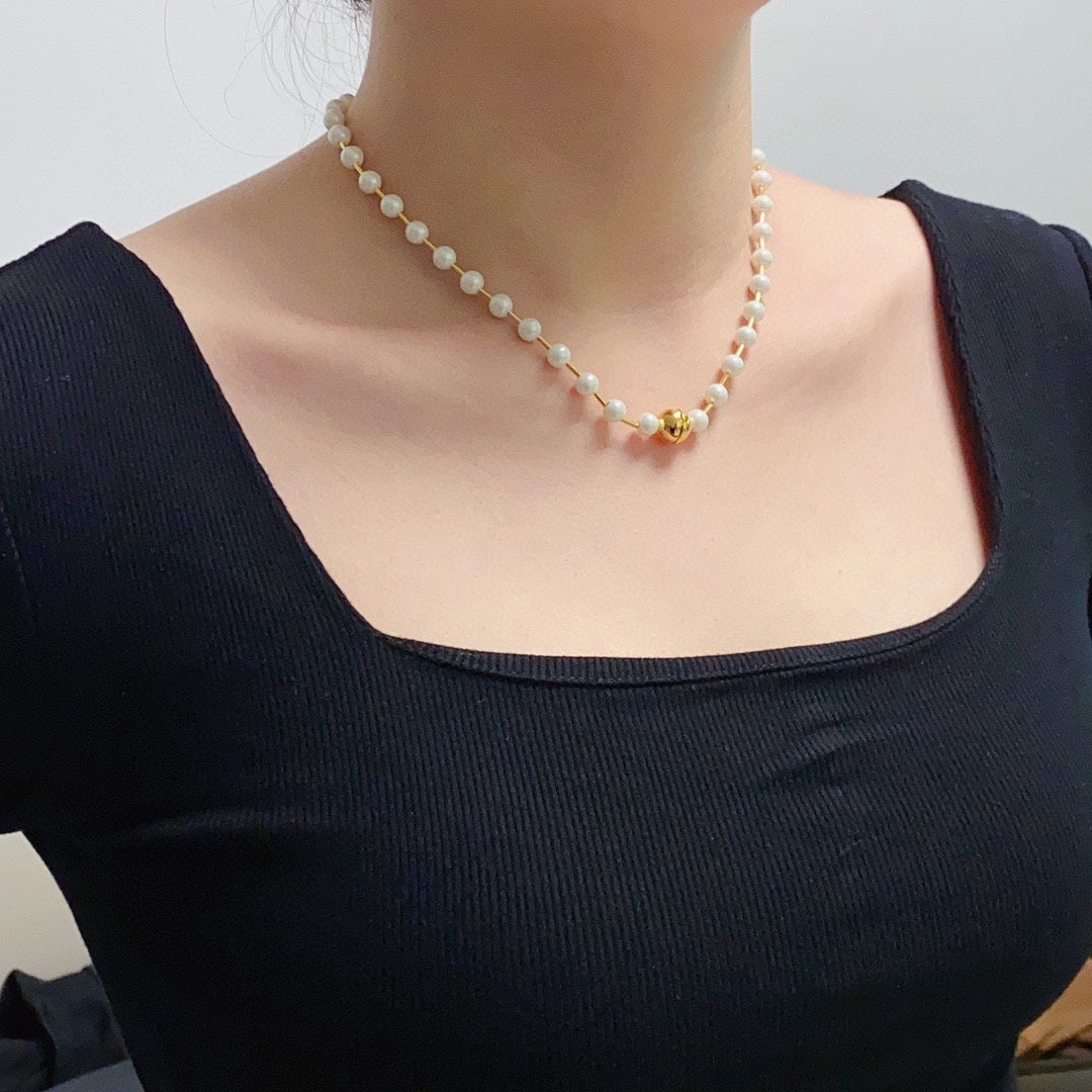 B pearl necklace