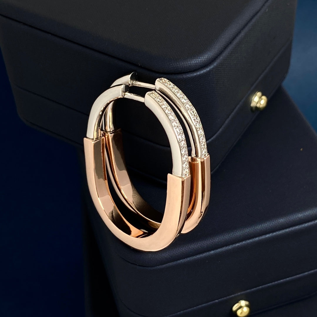 T bangle earrings with diamonds