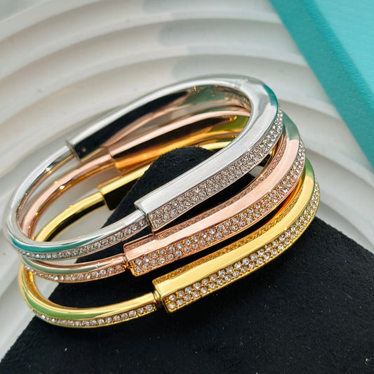 T bangle bracelet with diamonds