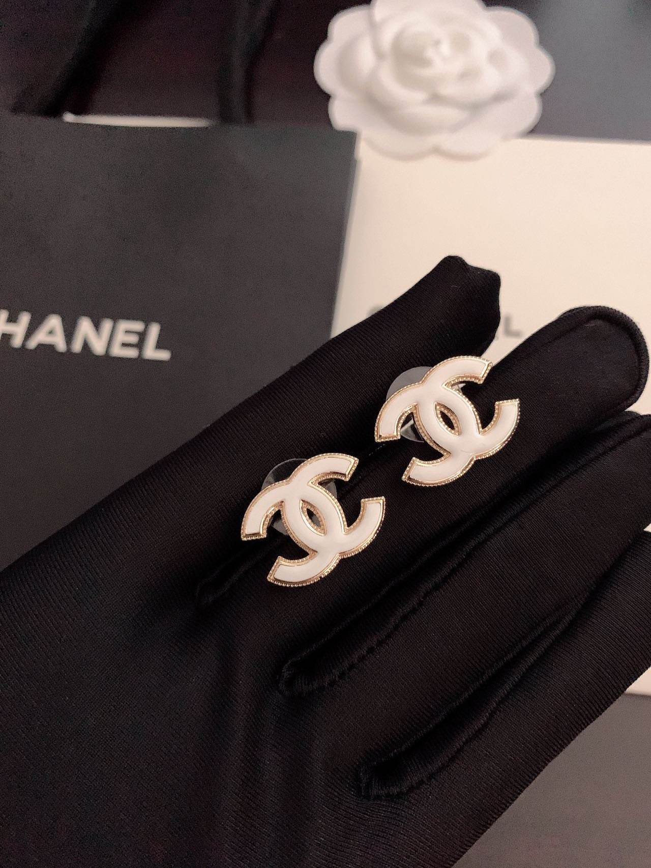 C white logo earrings