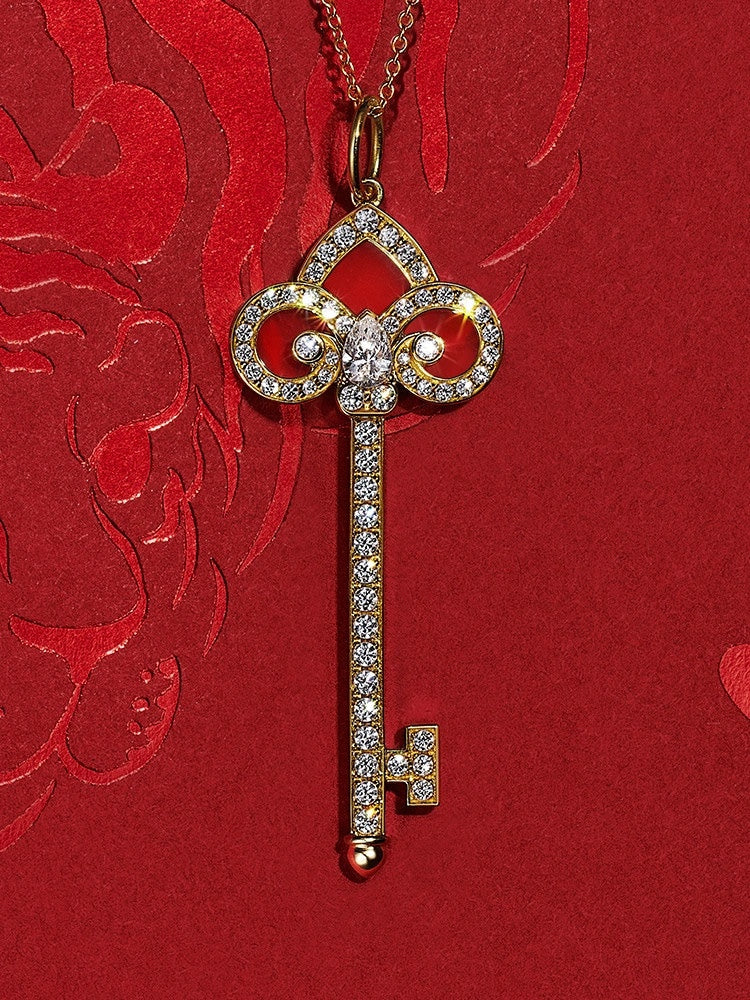 T key necklace
