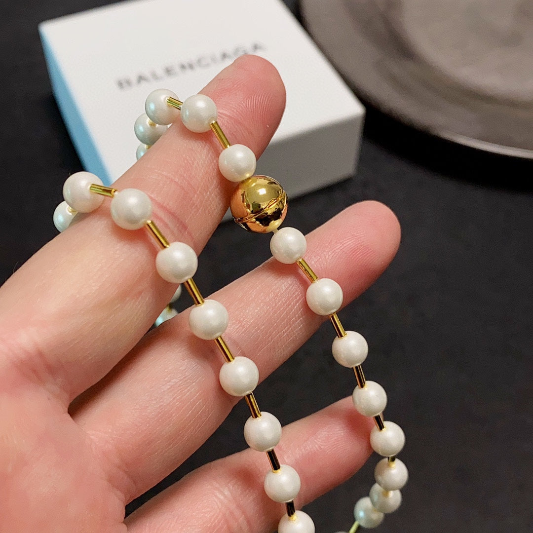 B pearl necklace
