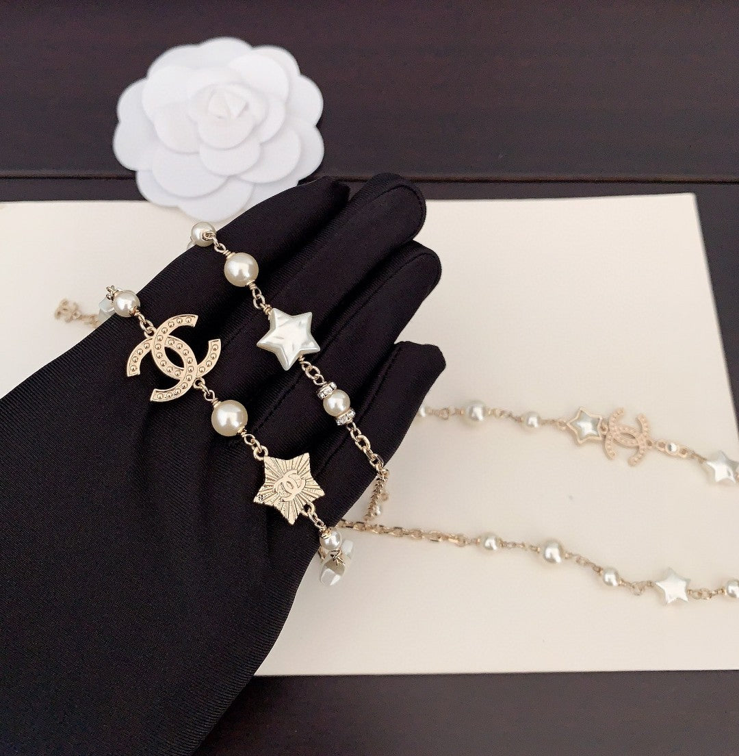 C star and logo necklace